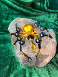 Orange and black beaded spider