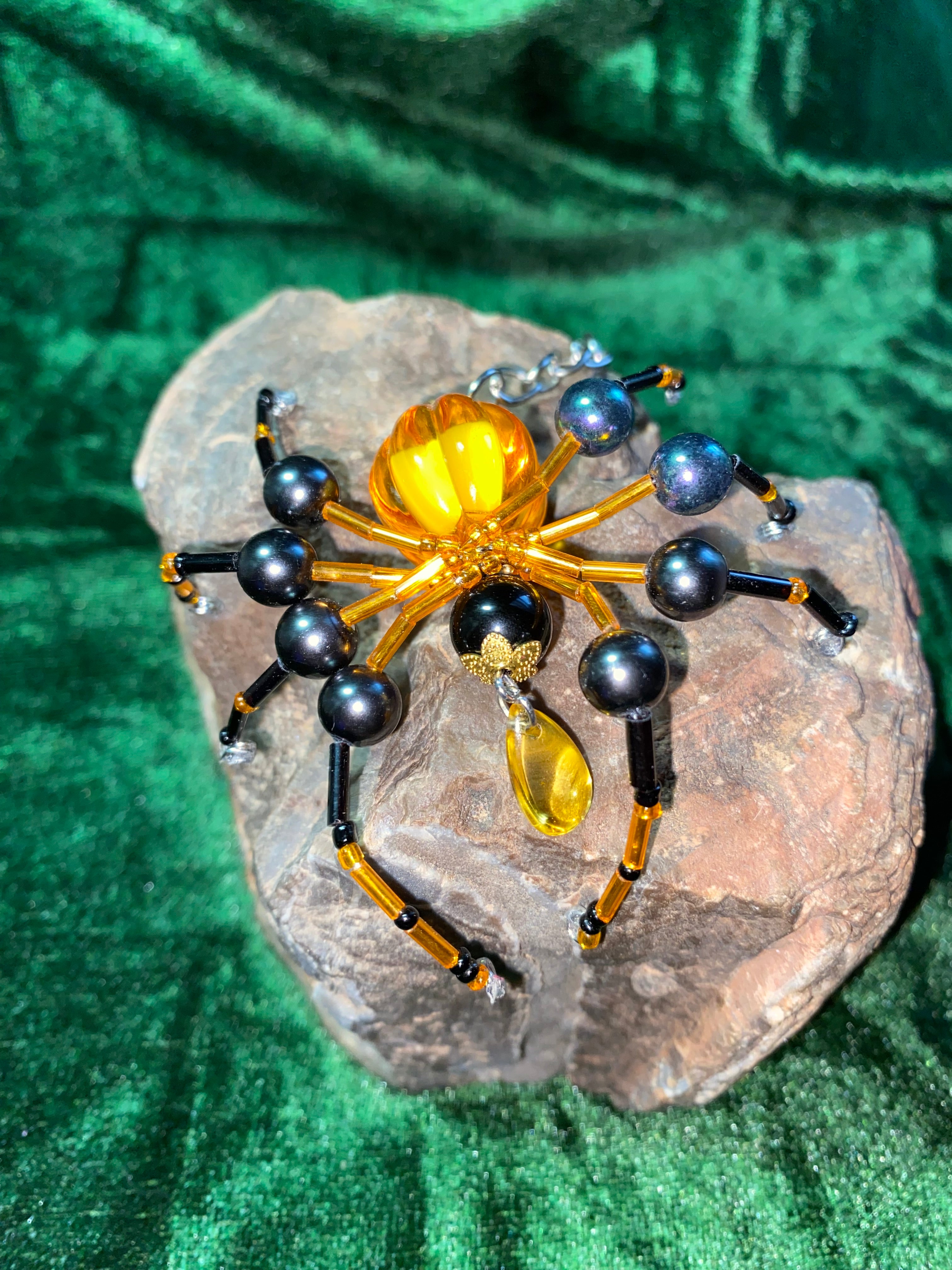 Orange and black beaded spider