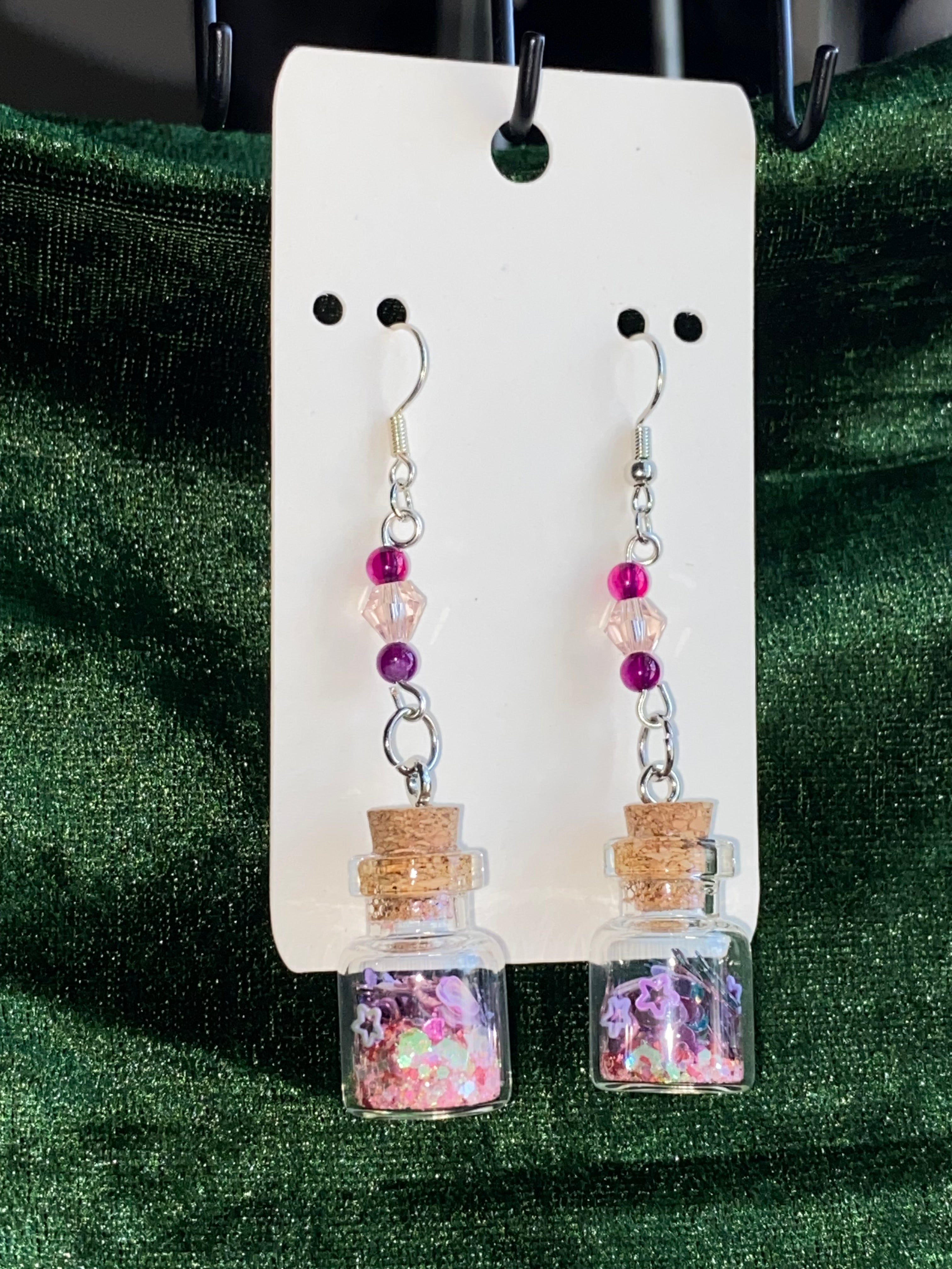 Pink potion bottle earrings