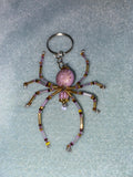 Purple and gold spider