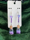 Purple flower potion bottle earrings