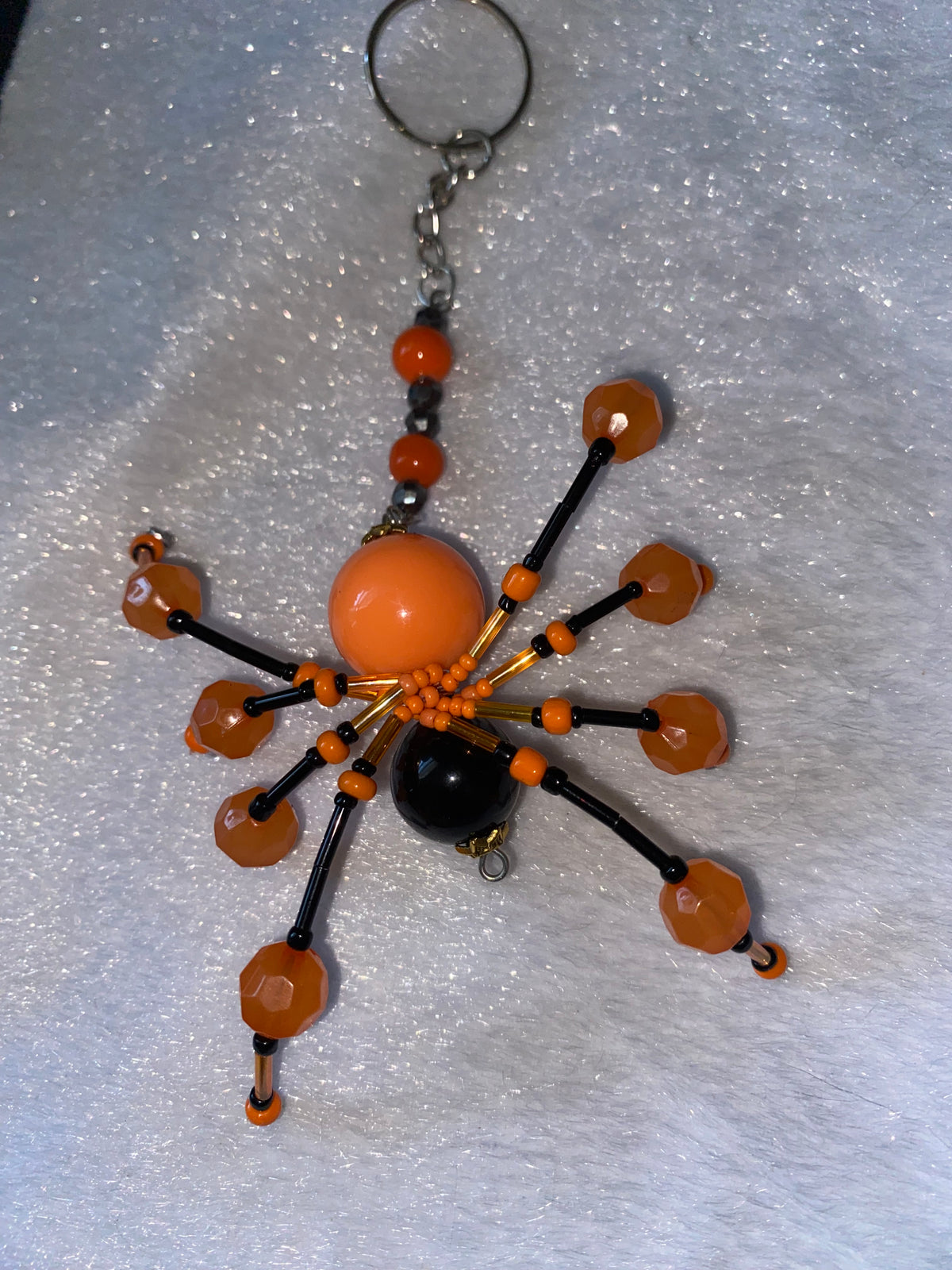 Orange and black spider keychain