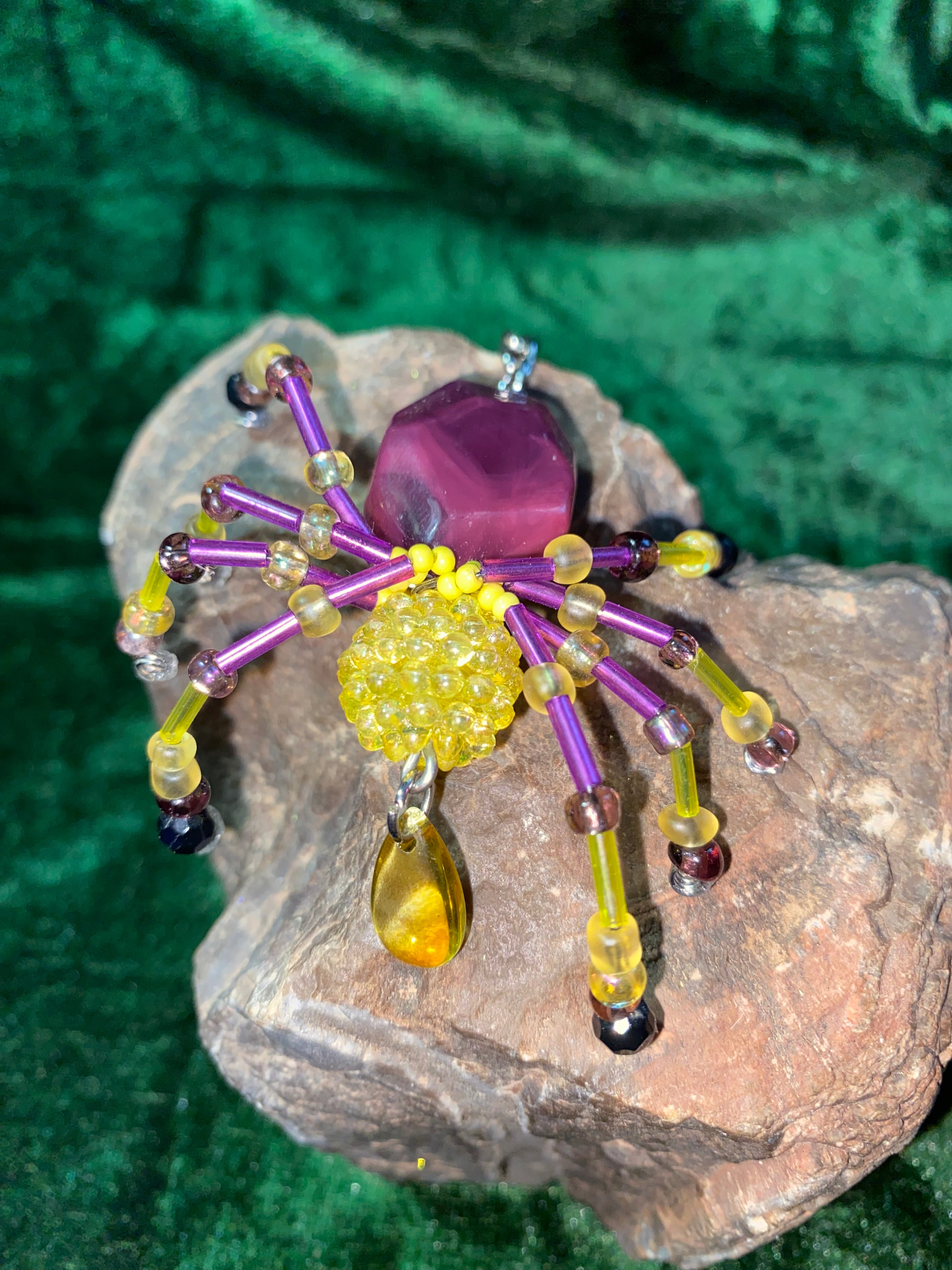 Purple and yellow beaded spider