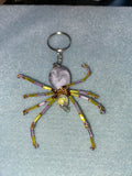 Purple and yellow beaded spider